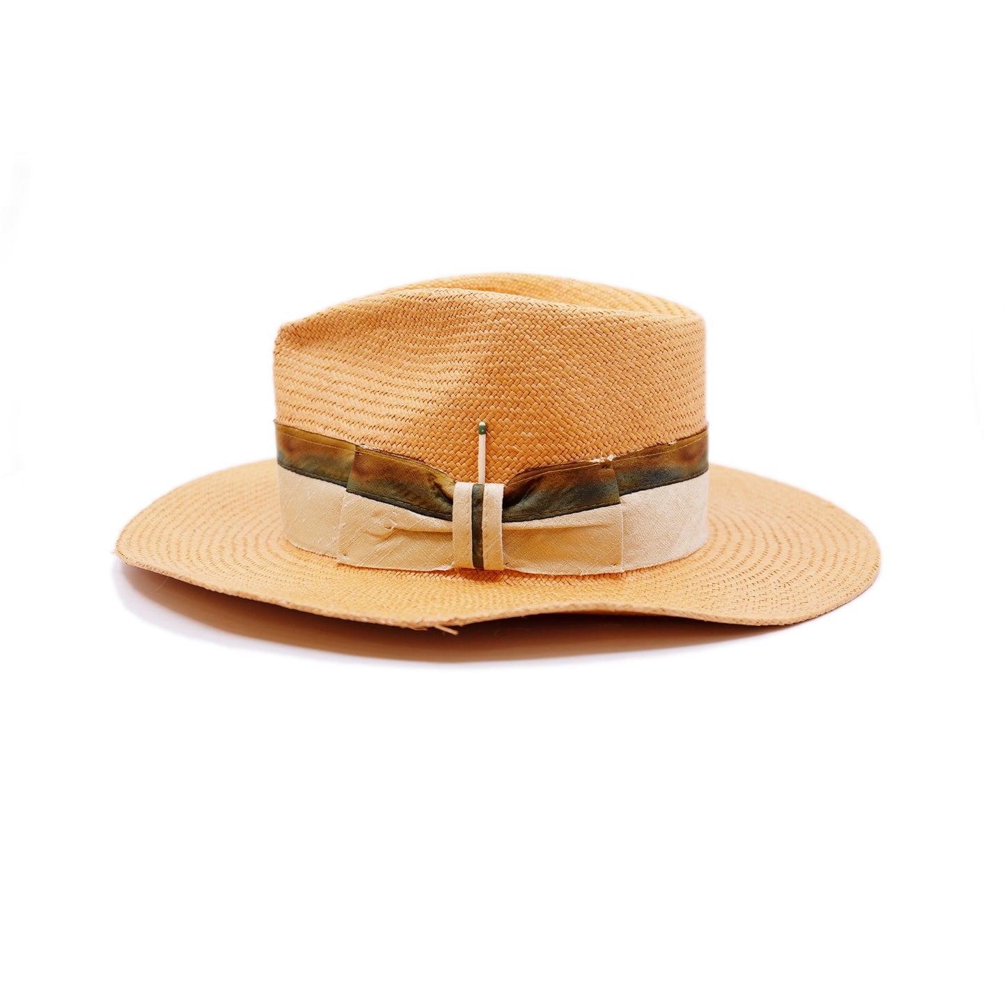 100% Ecuadorian straw hat in Pale Orange 2” Silk band with tie dyed silk binding Woven in Ecuador Flat brim Made in USA