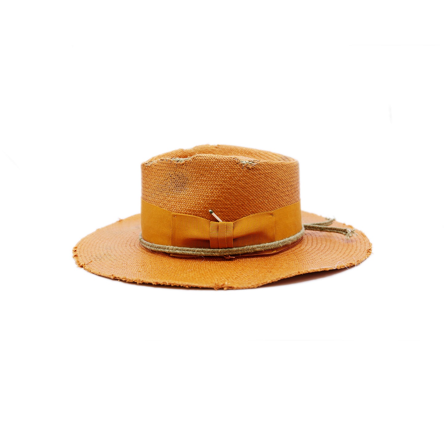 100% Ecuadorian straw hat in Tangerine 2” tonal grosgrain and woven herringbone 2-ply band and bow Distressed and inlay patchwork Woven in Ecuador Wavy brim Made in USA