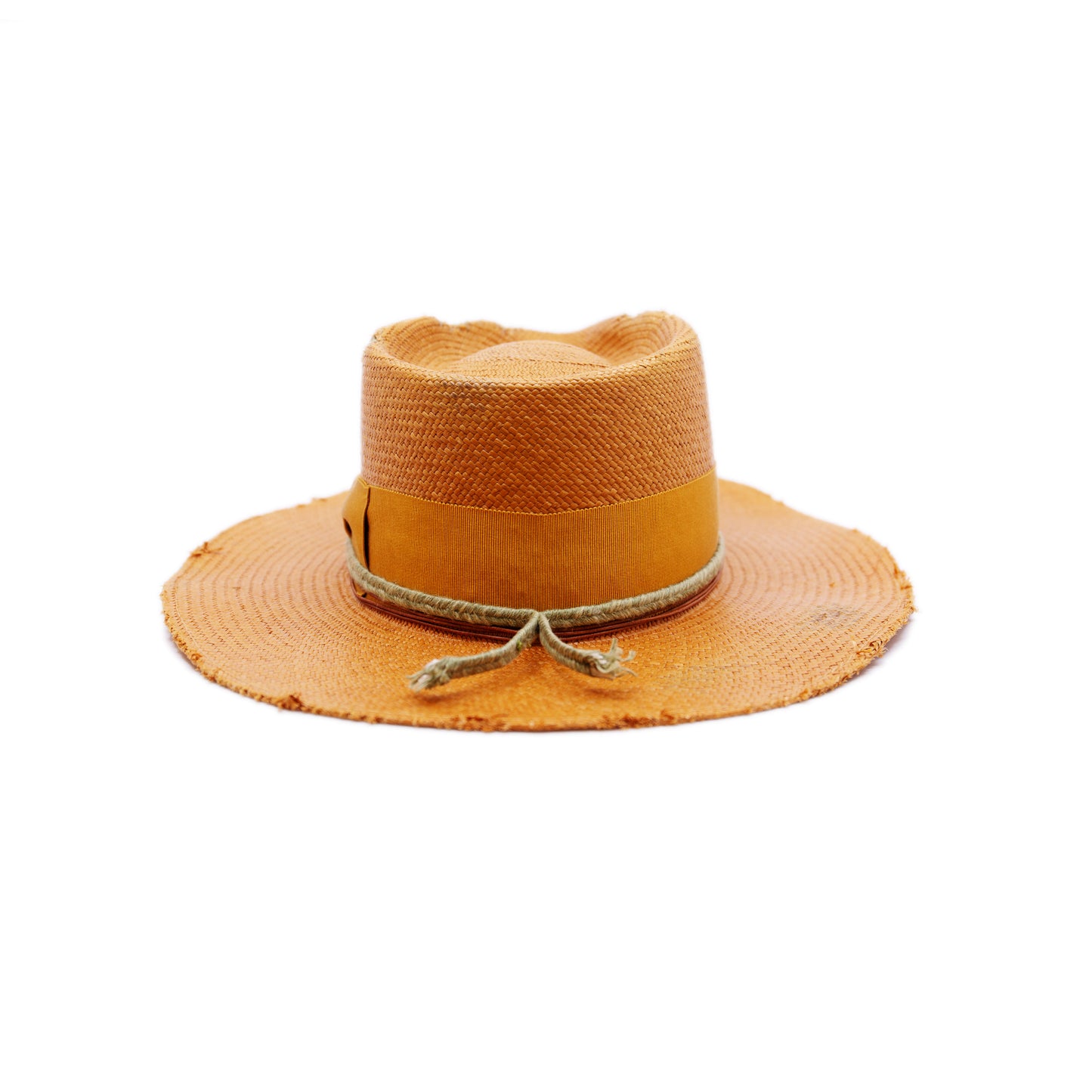 100% Ecuadorian straw hat in Tangerine 2” tonal grosgrain and woven herringbone 2-ply band and bow Distressed and inlay patchwork Woven in Ecuador Wavy brim Made in USA