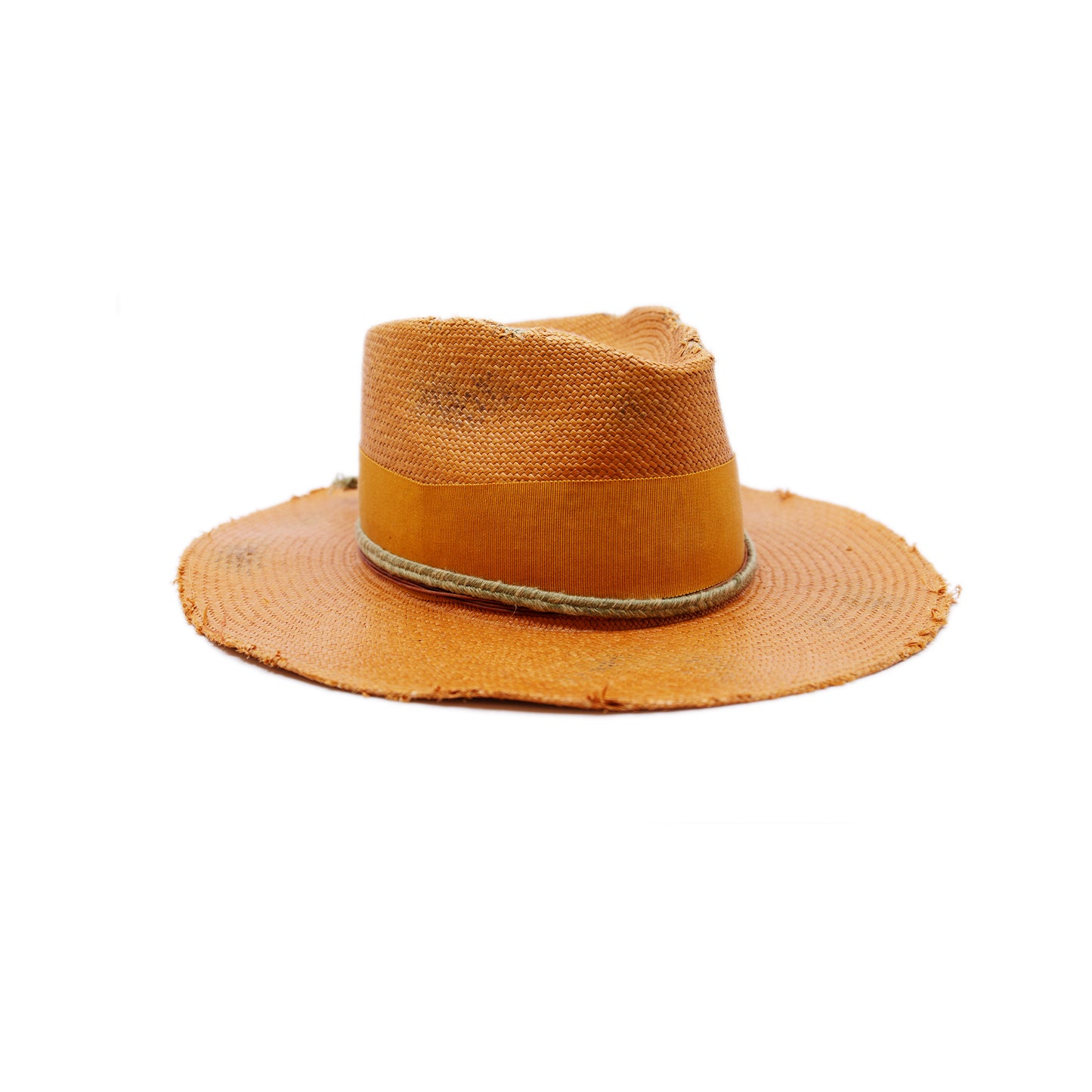 100% Ecuadorian straw hat in Tangerine 2” tonal grosgrain and woven herringbone 2-ply band and bow Distressed and inlay patchwork Woven in Ecuador Wavy brim Made in USA