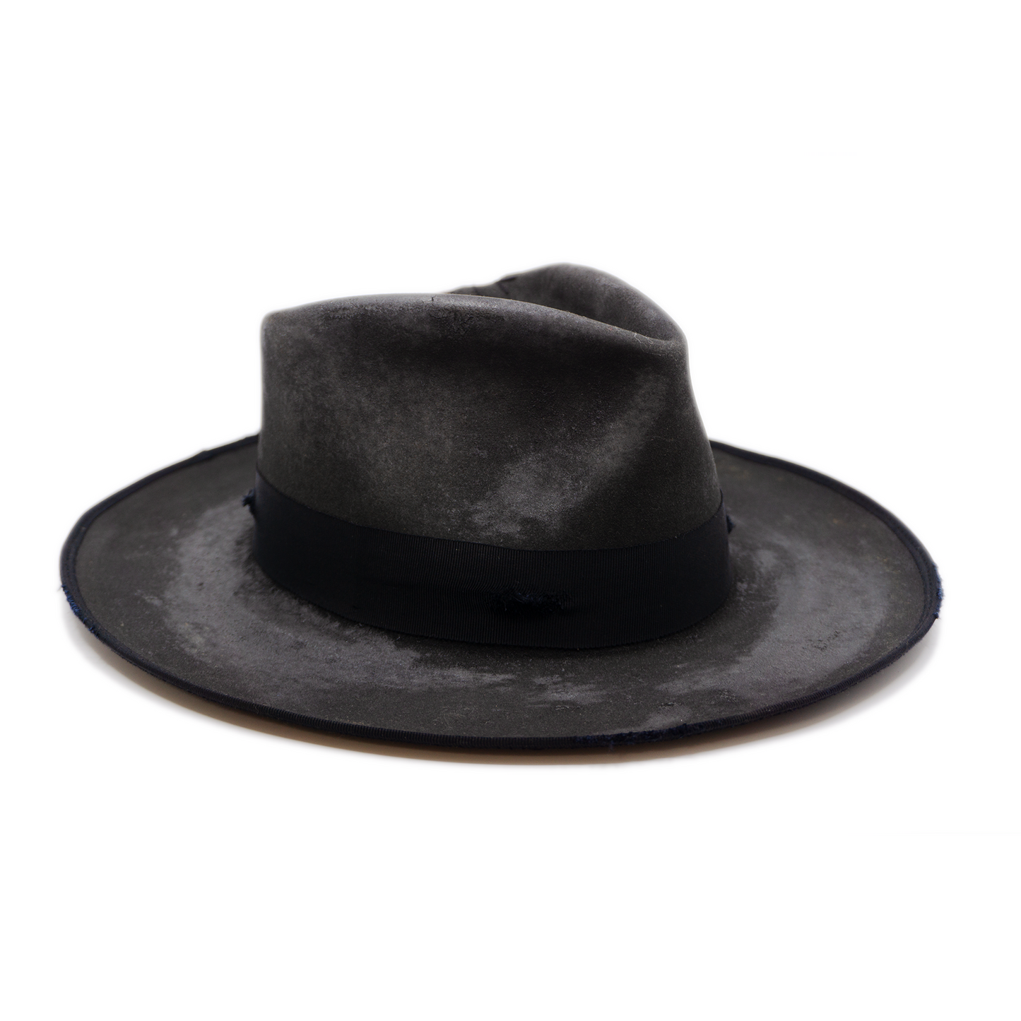100% felt hat in Night Crawler Western Weight 1 ½ “ distressed tonal grosgrain NF fabric patchwork on crown Full 9mm distressed binding Distressed Lighty flanged brim Made in USA