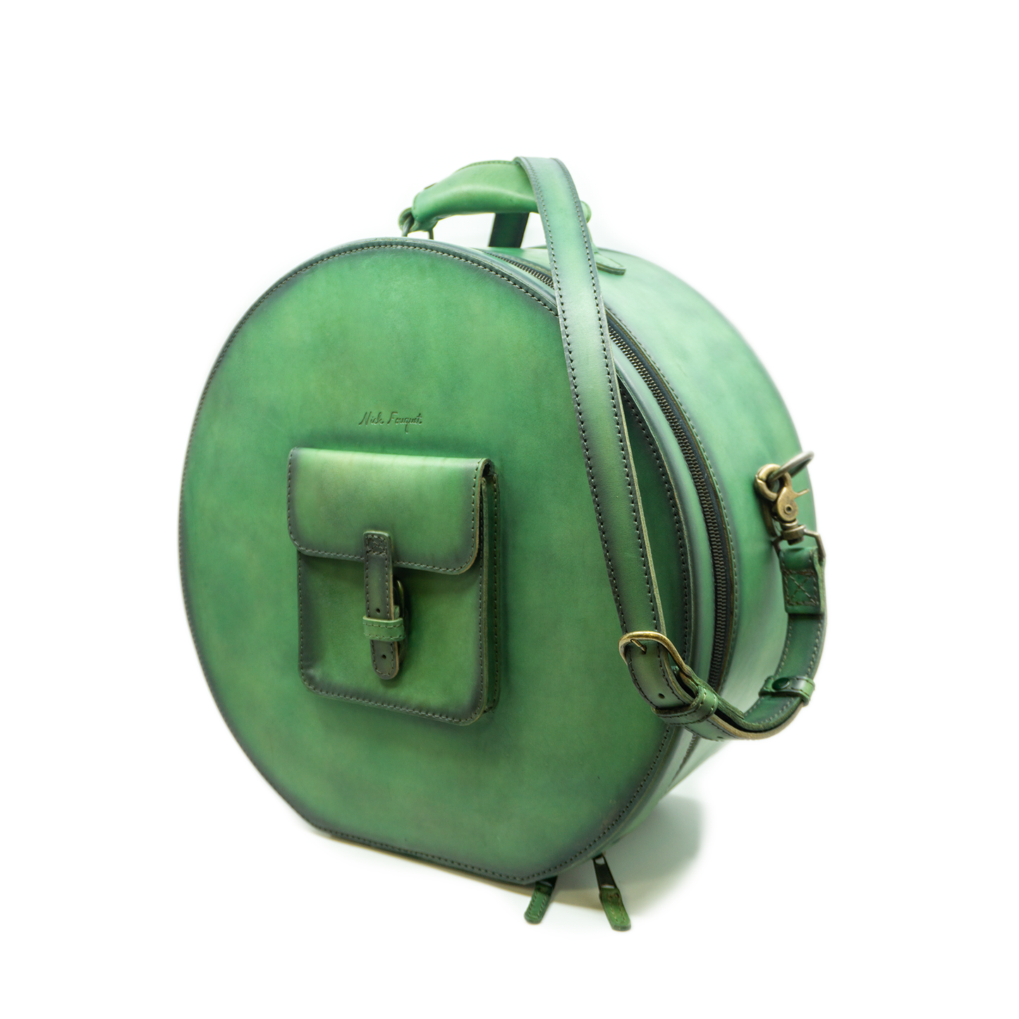 NF Travel Bag Natural Vegetable Tan Leather Hand burnished green dyed Leather zipper puller with Handle centered Unique NF linen print binding variations Removal division to protect the hat Custom Front Pocket with Strap Rounded Ending 7"H X 16"W 55" Adjustable Shoulder Straps