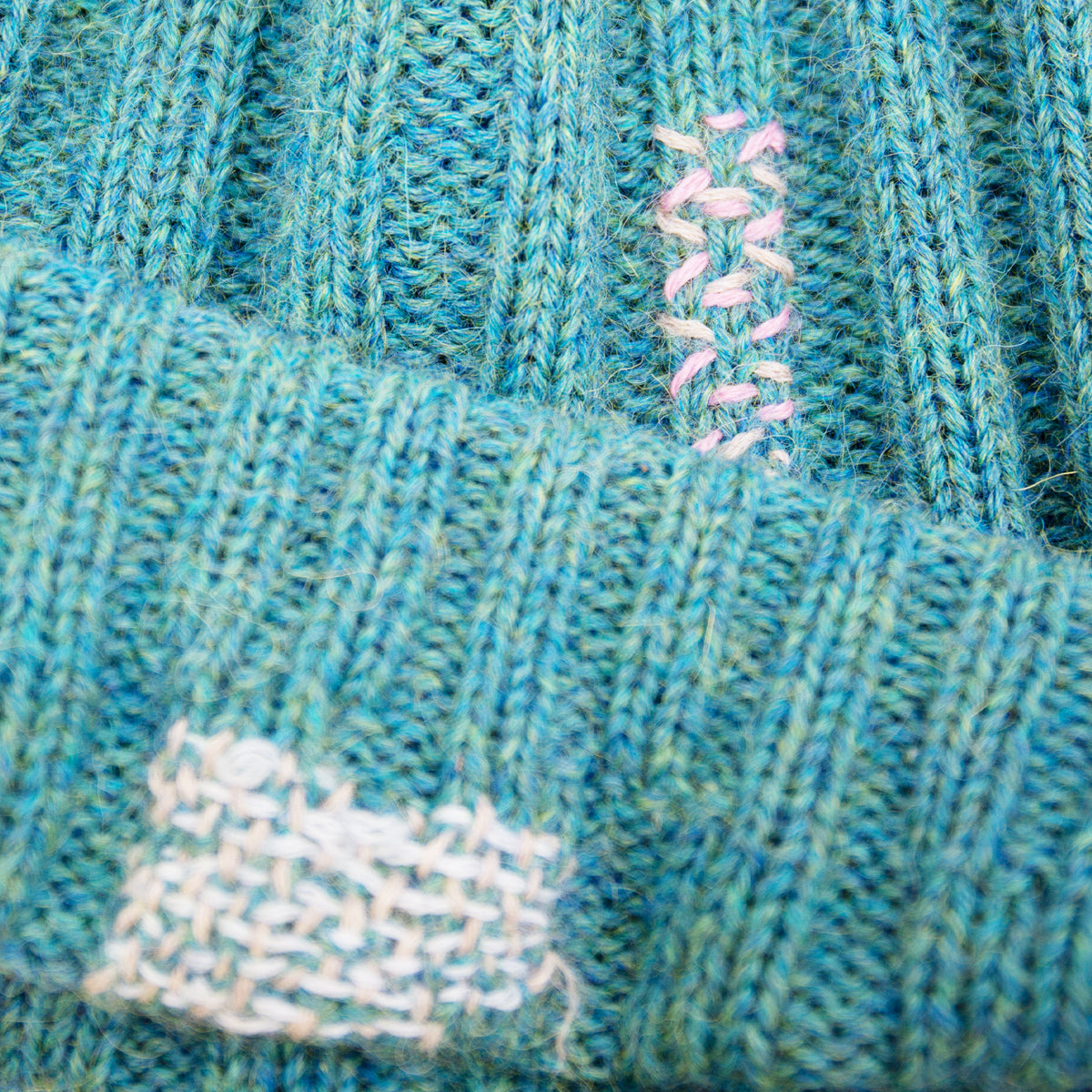 100% Baby Alpaca wool ribbed beanie in Pacific Ocean Blue Multicolored hand-embroidered mending Made in Los Angeles