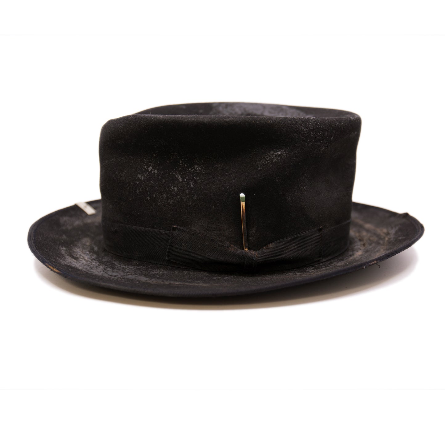 Nautholsvik 100% felt hat in Black Dress Weight 1” tonal herringbone band & bow Distressed and crushed Stove top hat with baby binding Silver NF swag clip Flanged brim Made in USA