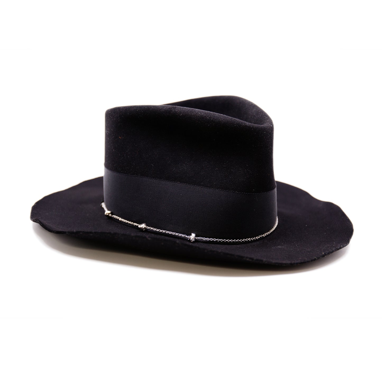 Dyrholaey 100% felt hat in Black Dress weight 2” tonal grosgrain band & bow NF alternating silver chain on base Organic uncut brim Made in USA