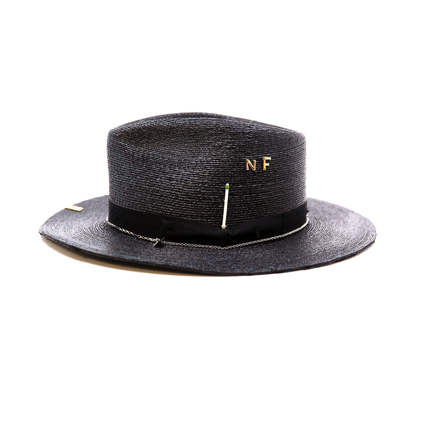 Numero 41 100% Mexican straw in Black 1" black herringbone band and bow with light distressing NF Italian chain on base Cartridge brass hat swag clip NF jewelry pieces on crown Woven in Mexico Slight cowboy flanged brim Made in USA