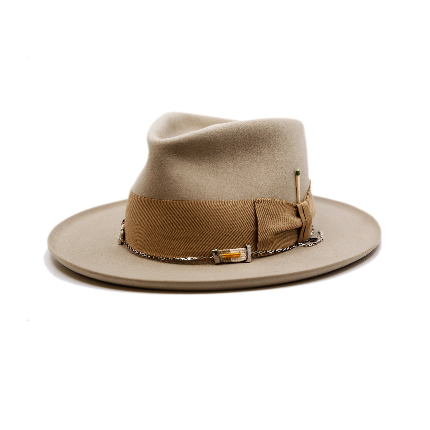 St. Palais 100% felt hat in Sand Western Weight 2" tonal herringbone band and bow NF Italian chain on base Slight pencil curled brim Made in USA