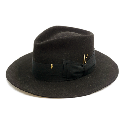 100% felt hat in Blackout Dress  Weight  2” Tonal herringbone band and double bow  Brass matchsticks and leaves throughout  Slight flanged  brim Made in USA 