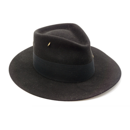 100% felt hat in Blackout Dress  Weight  2” Tonal herringbone band and double bow  Brass matchsticks and leaves throughout  Slight flanged  brim Made in USA 