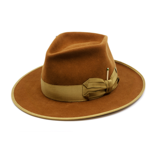 100% felt hat in Tobacco  Dress  Weight   1 ½” Grosgrain beige band with special bow  Custom NF brush in leather holder   Brass matchsticks and leaves throughout   12mm grosgrain beige binding  Light back pencil curled  brim  Made in USA