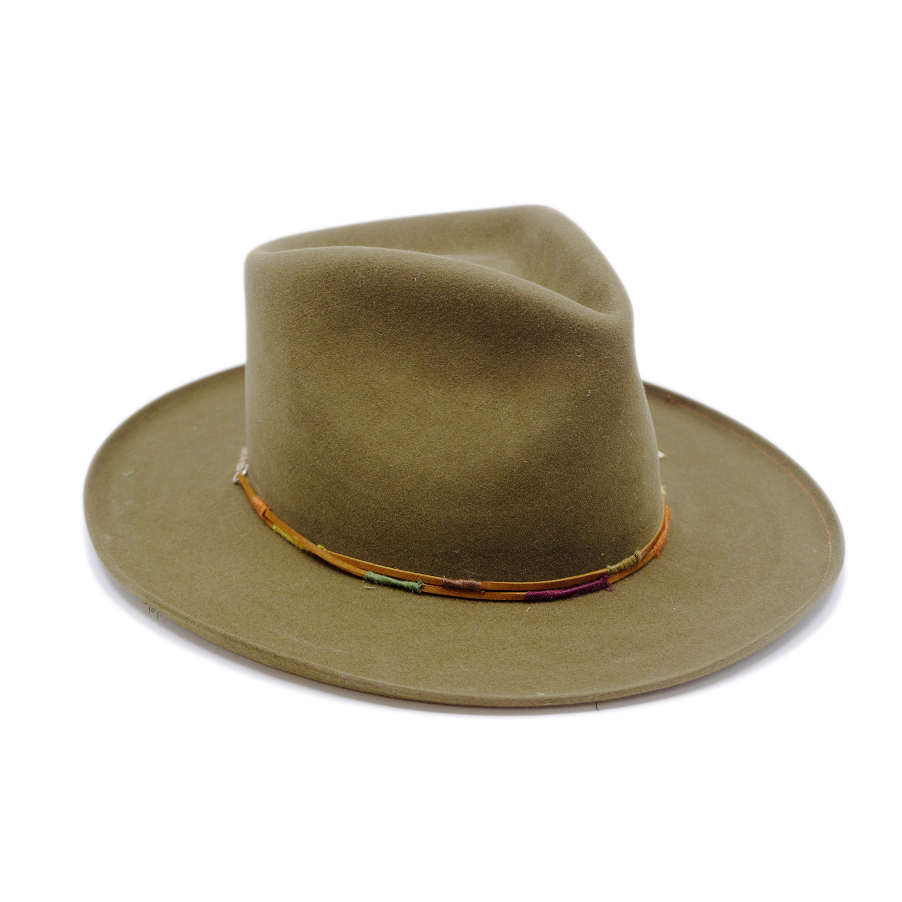 100% felt hat in New Green  Western  Weight   Braided twine and suede cord   with multicolor accents  threads   Italian ceramic pieces  on crown  Pencil curled  brim  Made in USA