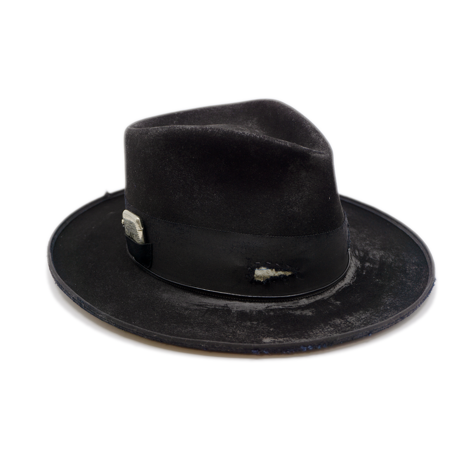 100% felt hat in Blackout  Western  Weight    2” distressed double layered band and bow  Distressed   Engraved NF silver matchstick   Holder in leather pocket   12mm distressed binding  Pencil curled  brim  Made in USA