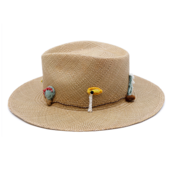 100% Ecuadorian straw in Natural Brown  Handmade  wool cacti accents and lit matchstick band  Woven in Ecuador  Flat brim  Made in USA