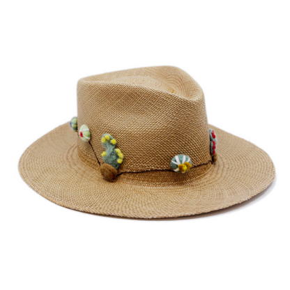 100% Ecuadorian straw in Natural Brown  Handmade  wool cacti accents and lit matchstick band  Woven in Ecuador  Flat brim  Made in USA