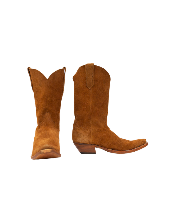 Two whiskey brown suede Serpent Cutter western-style boots with cowboy heels shown from the front and side.