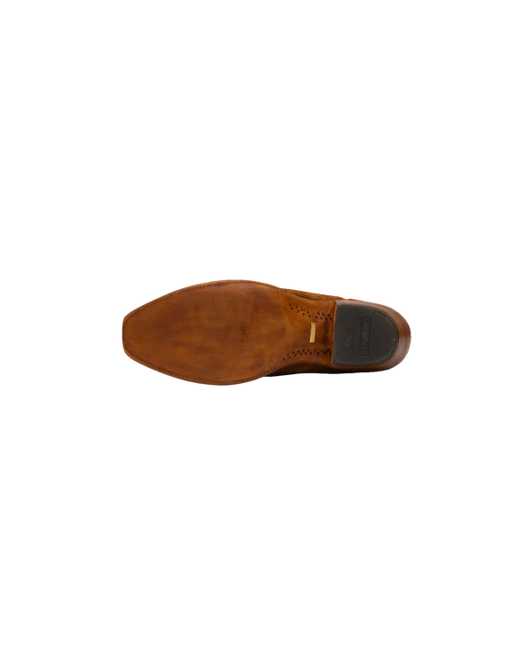 The sole of a whiskey brown Serpent Cutter leather boot with a stacked cowboy heel.