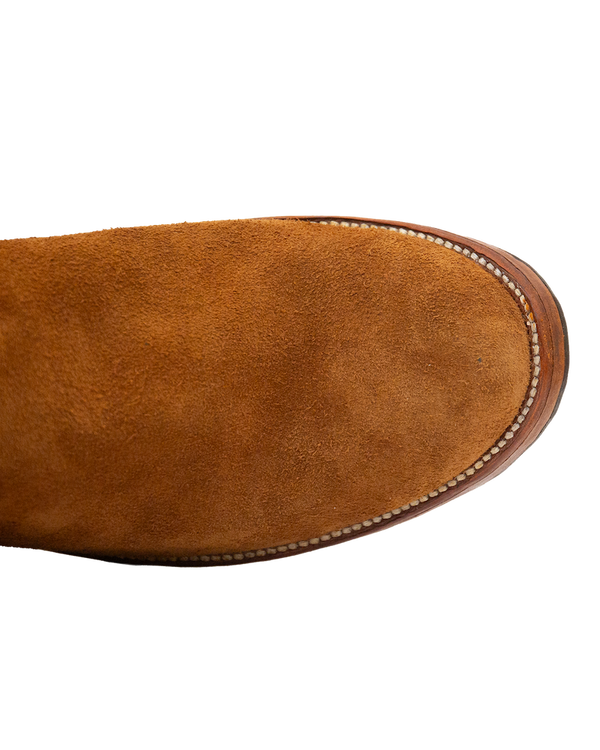 Top-down view of the Silo Roper, a whiskey brown suede roper boot toe in rough-out hide.