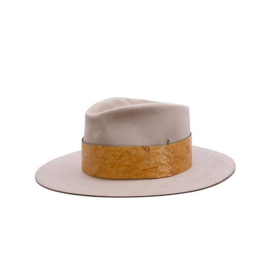 100% Dress Weight Felt in Côte Sauvage  2" Reishi™ band MycoWorks Fine Mycelium™ leather alternative with green edge finishing  Single row ticking with green edge finishing  Burnt silver NF matchstick  Flat brim  Made in California