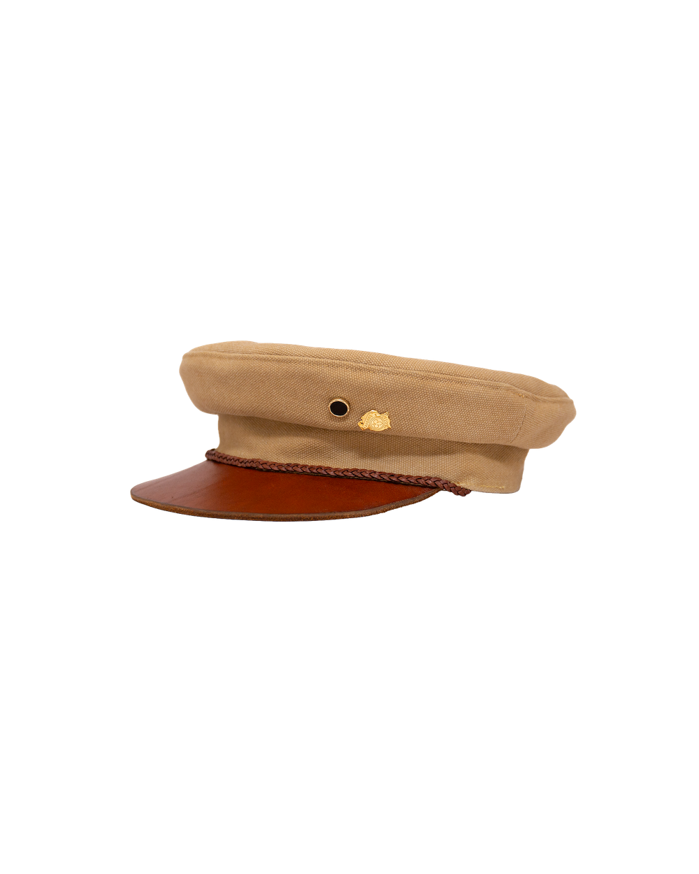Alcyon captain’s hat in tan canvas with a vachetta leather brim and a braided cord trim.