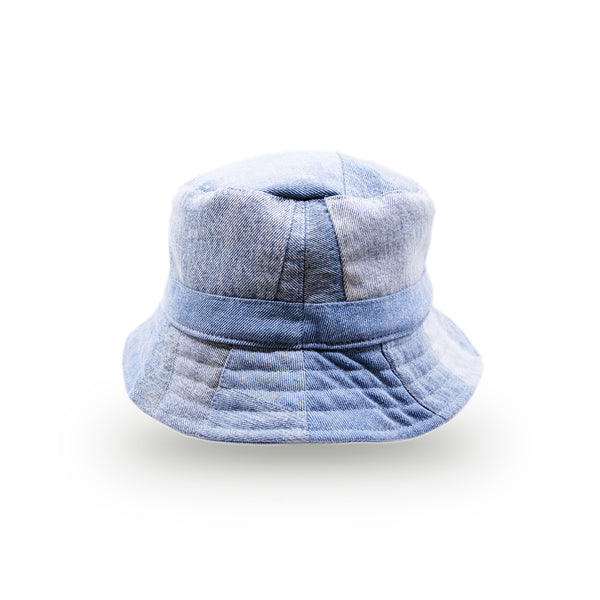 100% cotton bucket hat in blue denim  Deadstock denim patchwork   Actual product may differ from pictured due to limited nature of deadstock fabric  Made in LA