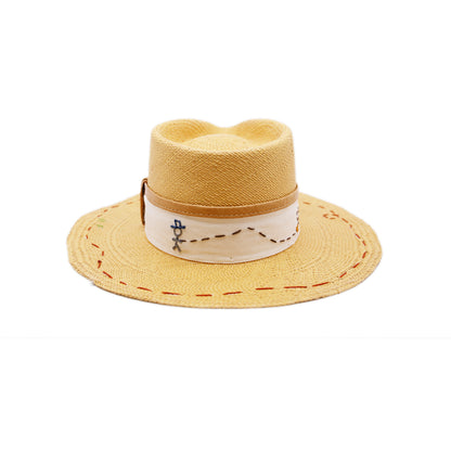 Round Up 100% Ecuadorian straw in Faded Mustard   2” grosgrain with cowpoke embroidery band  Leather binding on band   NF lasso embroidery around the brim  Woven in Ecuador  Flat brim   Made in USA
