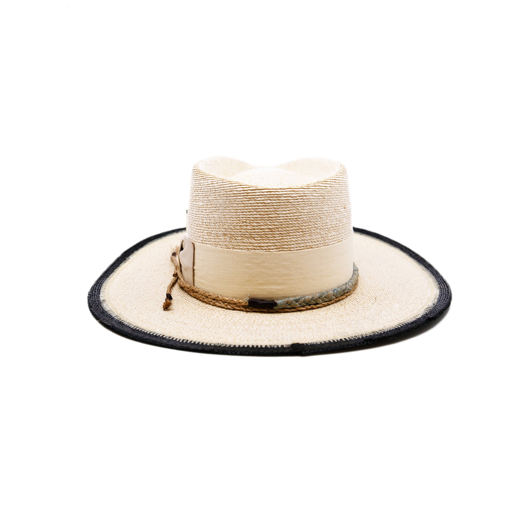 100% Mexican straw in Cream and Black  2" cream herringbone band and leather bow  Wrapped twine band  3 1/2"  Two-tone brim  Woven in Mexico  Subtle western flanged brim  Made in USA