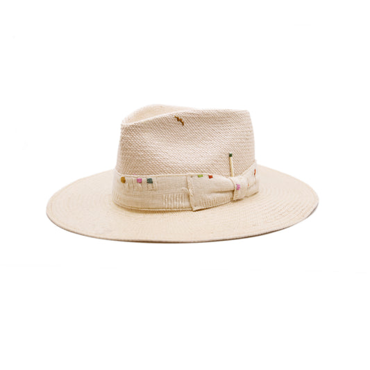 100%  ecuadorian straw hat  in Nude  2” Tonal woven band   Multi color embroidery throughout the band and crown   Woven in Ecuador  Wavy brim   Made in USA 