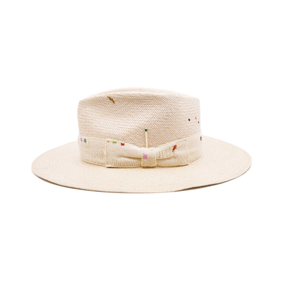 100%  ecuadorian straw hat  in Nude  2” Tonal woven band   Multi color embroidery throughout the band and crown   Woven in Ecuador  Wavy brim   Made in USA 