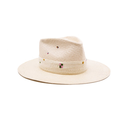 100%  ecuadorian straw hat  in Nude  2” Tonal woven band   Multi color embroidery throughout the band and crown   Woven in Ecuador  Wavy brim   Made in USA 