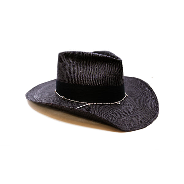 100%  Ecuadorian straw hat in Black   1 ½” herringbone band & Bow  Alternating silver chain with silver leaf accouterments     Woven in Ecuador  Western flanged brim  Made in USA 