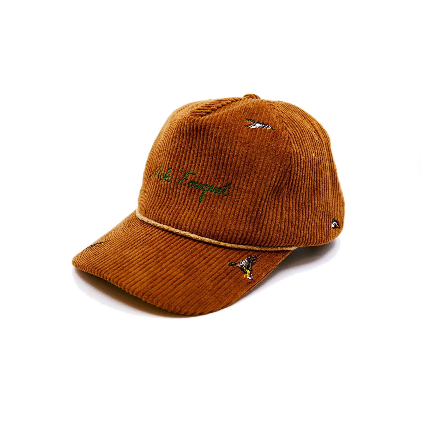 Green Mallard Cap  100% corduroy in Camel  Multicolor mallard duck embroidery throughout  Nick Fouquet embroidery   Braided rope on bill  Aspen embroidery on strap  Embroidered matchstick on reverse side  One size fits all  Made in Los Angeles 