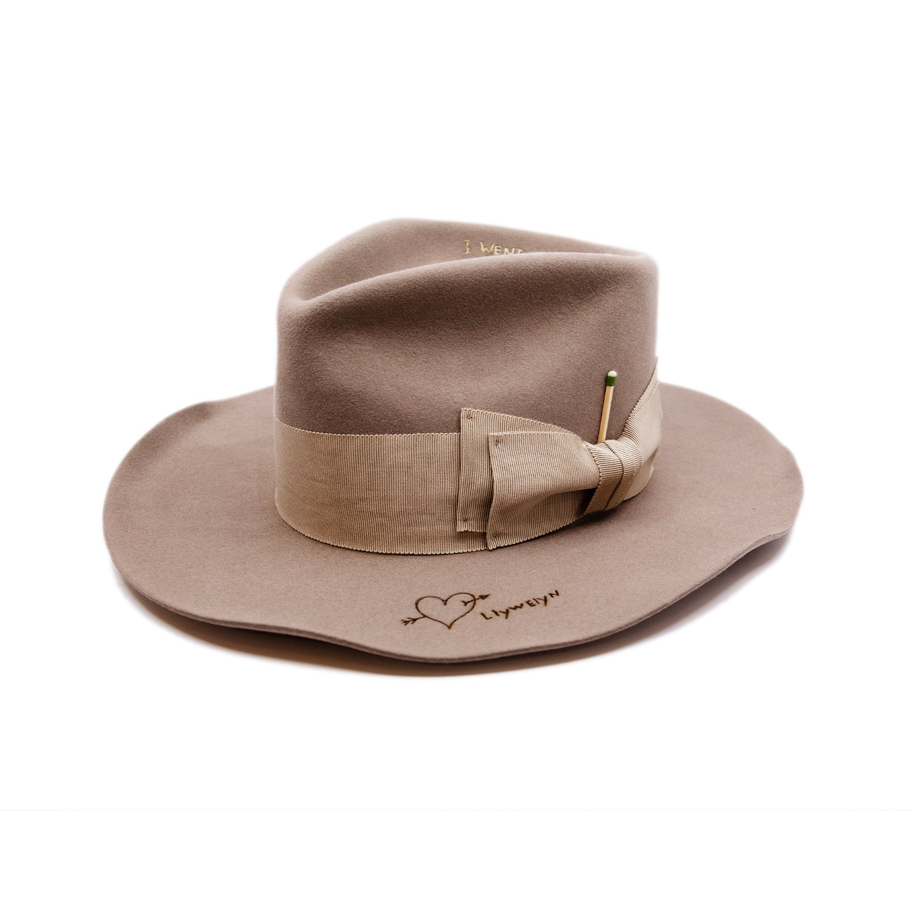 Moonshiner Hat  100% felt hat in Natural  Western Weight  2” grosgrain Butterfly Bow  "Sleepy Holler phrases branded and hand embroidered throughout crown and brim"  Wavy brim  Made in USA
