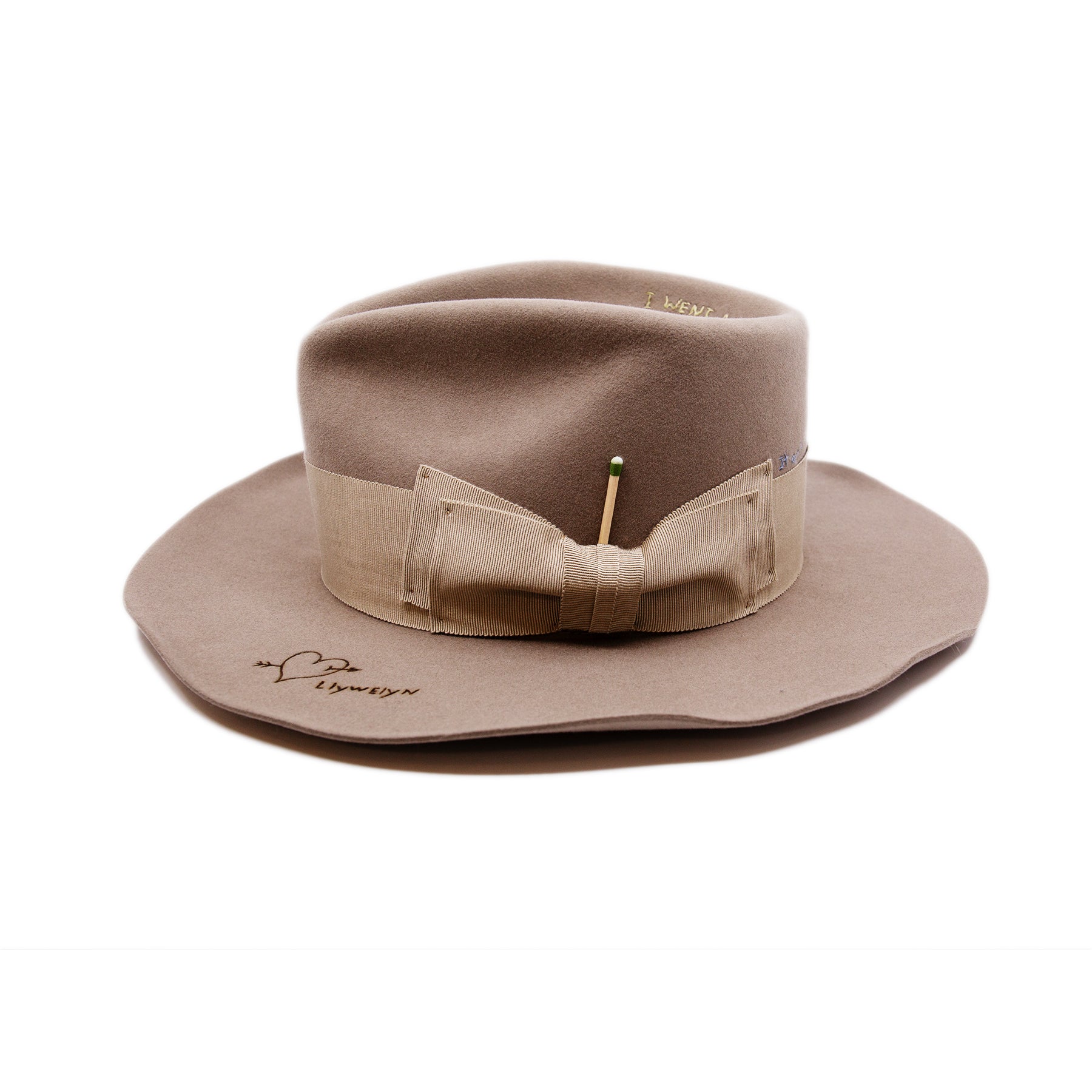 Moonshiner Hat  100% felt hat in Natural  Western Weight  2” grosgrain Butterfly Bow  "Sleepy Holler phrases branded and hand embroidered throughout crown and brim"  Wavy brim  Made in USA