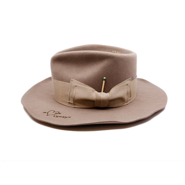 Moonshiner Hat  100% felt hat in Natural  Western Weight  2” grosgrain Butterfly Bow  "Sleepy Holler phrases branded and hand embroidered throughout crown and brim"  Wavy brim  Made in USA