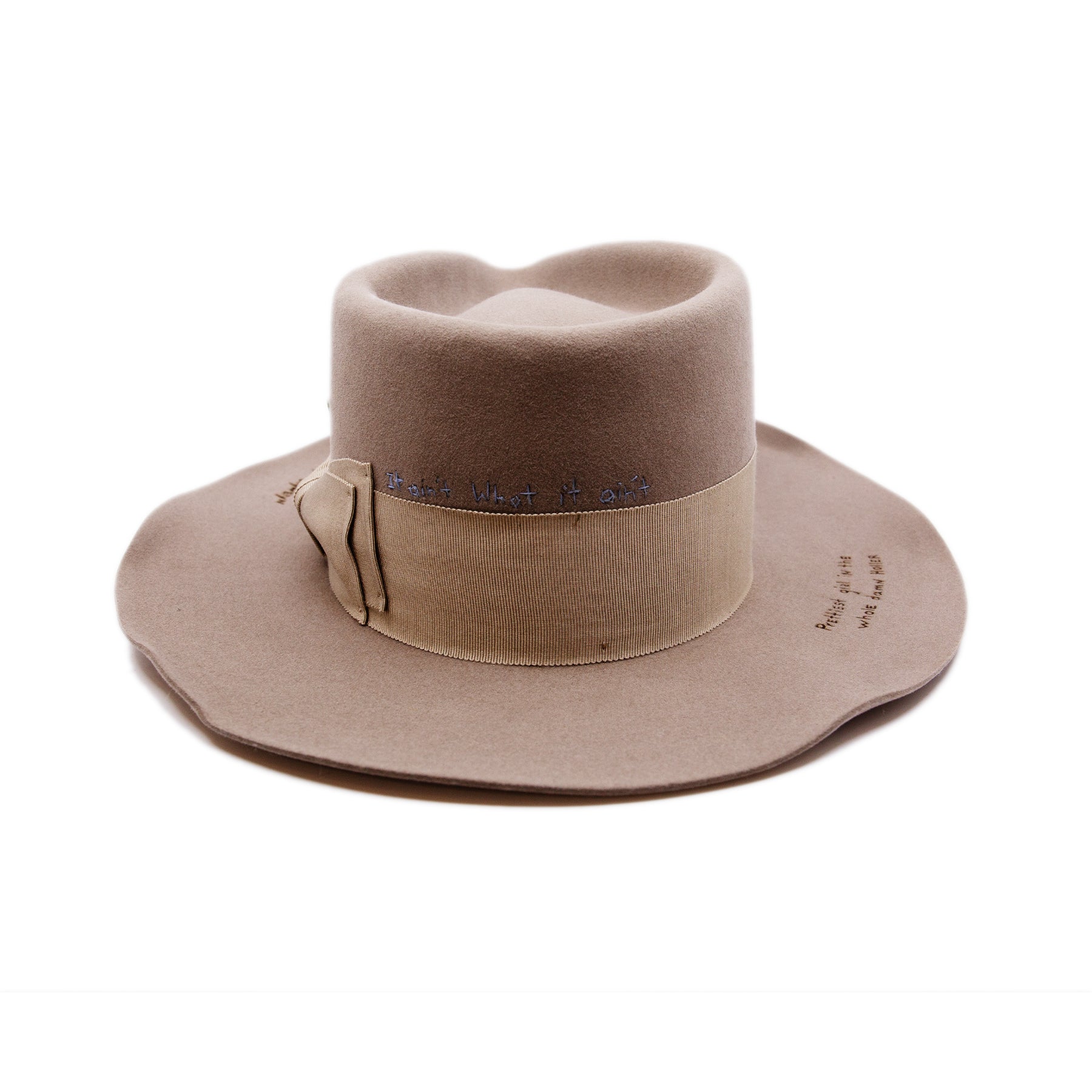 Moonshiner Hat  100% felt hat in Natural  Western Weight  2” grosgrain Butterfly Bow  "Sleepy Holler phrases branded and hand embroidered throughout crown and brim"  Wavy brim  Made in USA