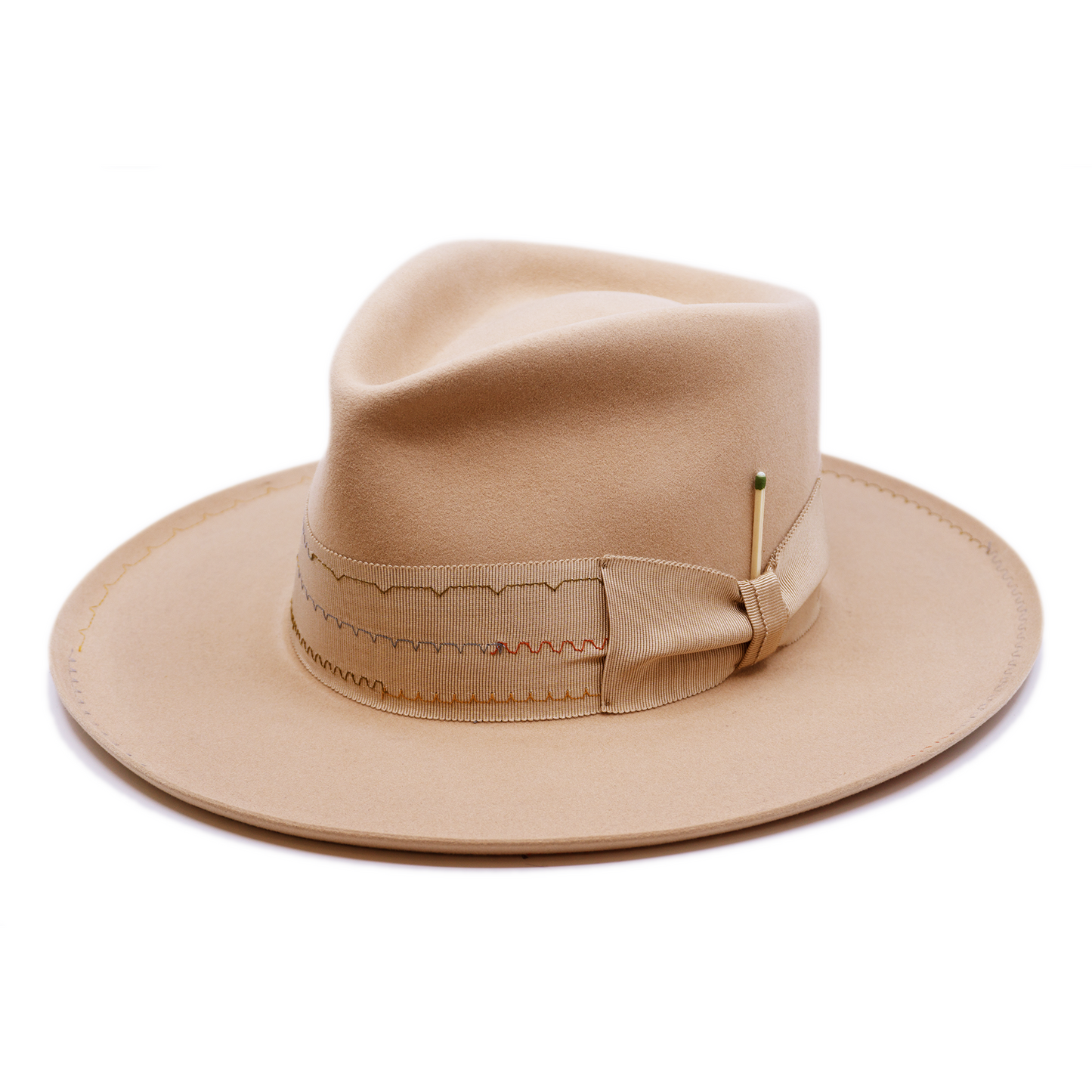 100% felt hat in Nude  Western Weight   2” tonal grosgrain with zig zag multi color stitching on band   2" tonal grosgrain bow  Multi colored zig zag stitching on brim   Pencil curled brim  Made in USA