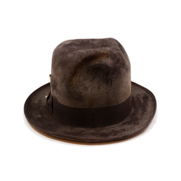 100% felt hat in Slate   Western Weight   1 ½ “  tonal grosgrain with   Mini turquoise pin on bow   Tonal 9mm binding   Distressed  Pencil curled brim  Made in USA