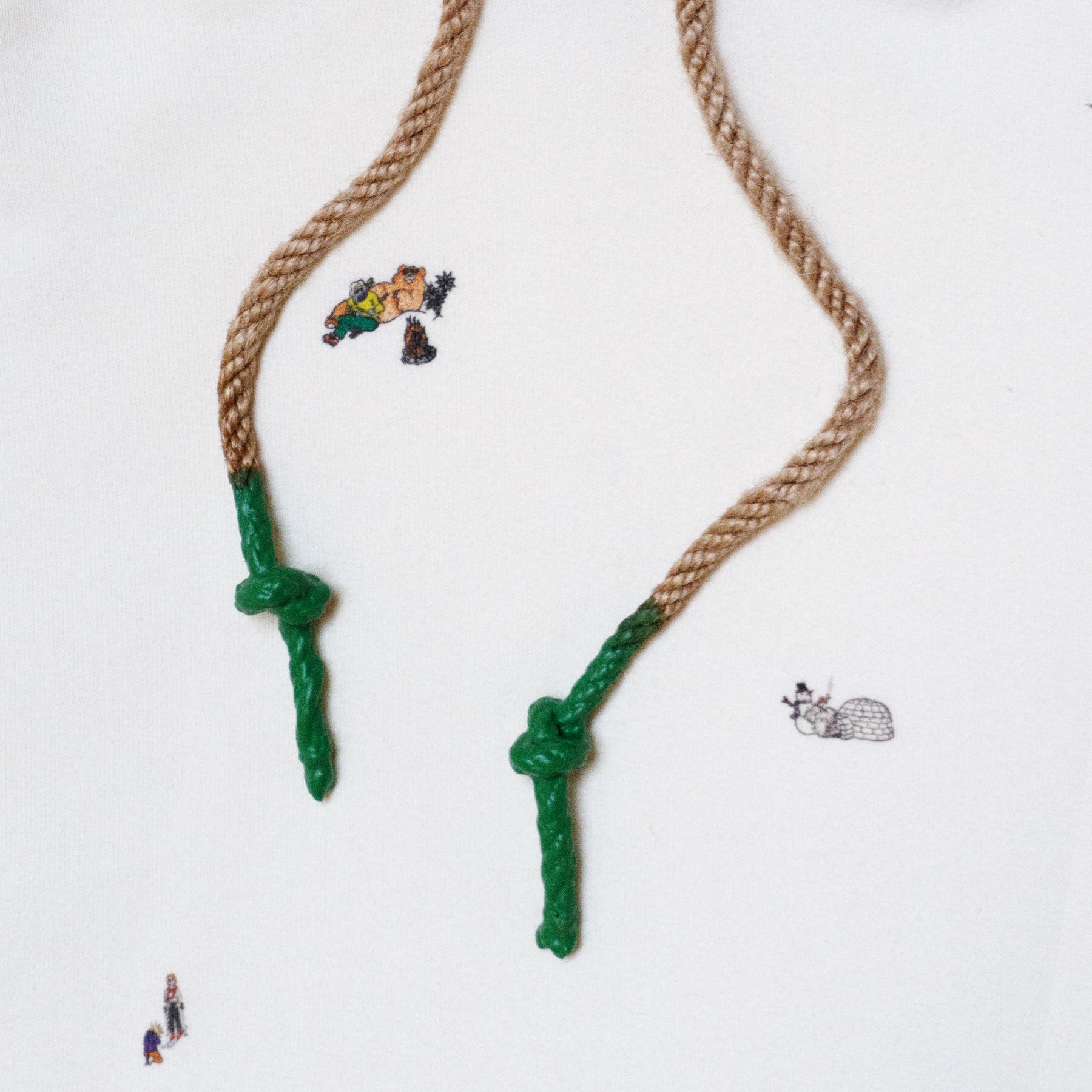 100% cotton french terry  Allover Aspen mountain scene print   Thick rib waistband and cuffs  Twine rope drawstrings with rubberized green ends  Matchstick embroidery  Made in Los Angeles