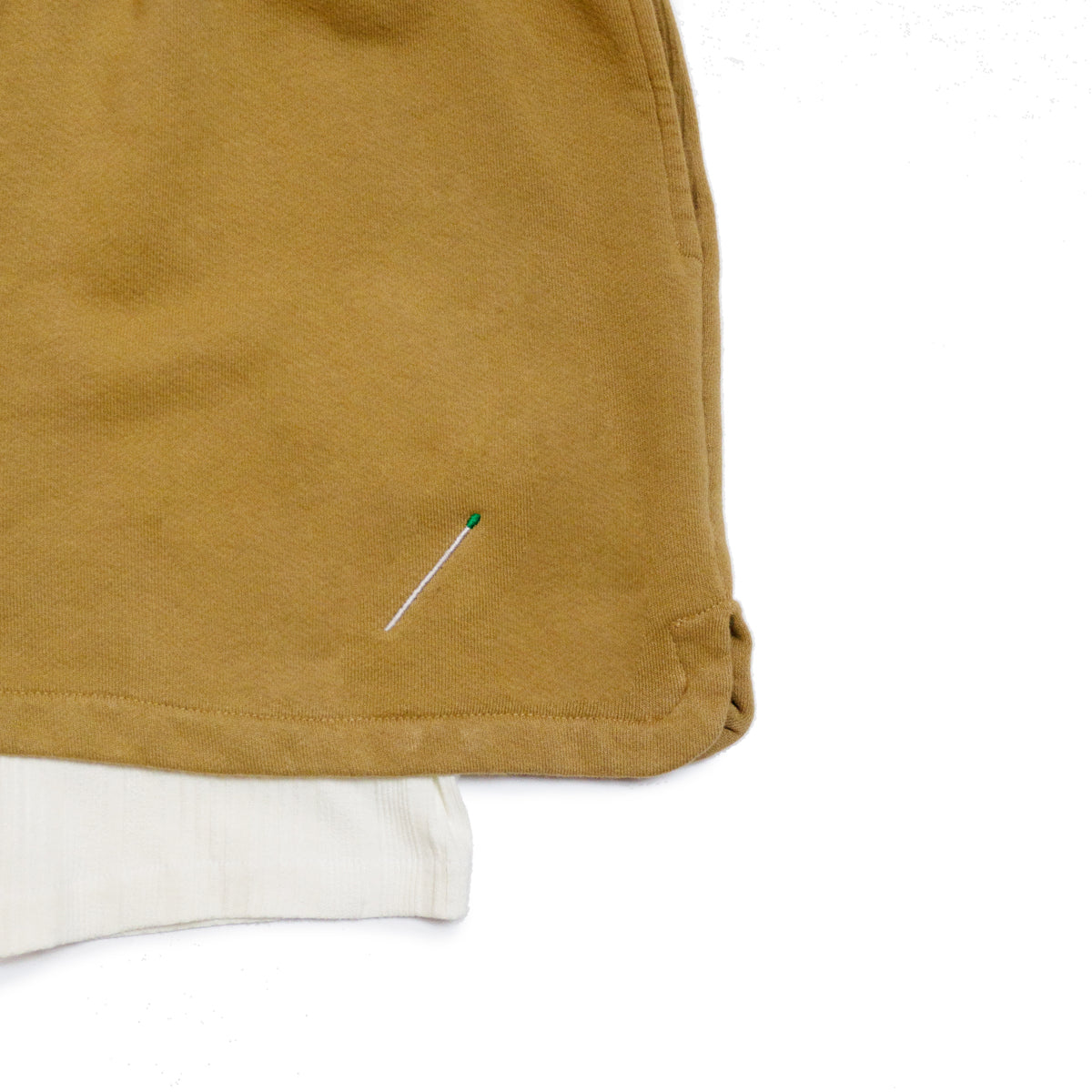 Double layered shorts  Outer layer:100% cotton french terry  Inner layer: 95% cotton / 5% elastane  Thick rib waistband  Matchstick embroidery  Made in Los Angeles