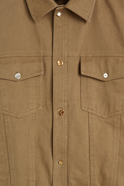 Nick Fouquet’s beige Tarcisio blouson is made from stone-washed cotton twill, then is accented by jewellery-inspired gold hardware.  Beige twill blouson jacket Gold-tone and metal buttons Composition: 100% Cotton Lining: 44% rayon, 40% cotton, 16% polyamide. Dry clean Country of origin: Italy