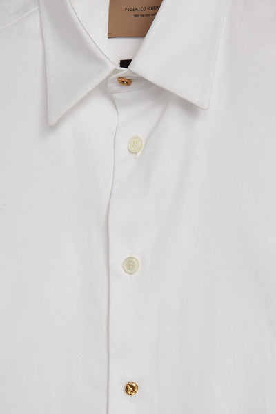Nick Fouquet’s white cotton-poplin Tolomeo shirt has gold jewellery-style hardware on the collar and buttons for a modern reimagining of tailoring codes.  White lightweight cotton poplin shirt Gold collar and button hardware Composition: 100% cotton. Dry clean Country of origin: Italy