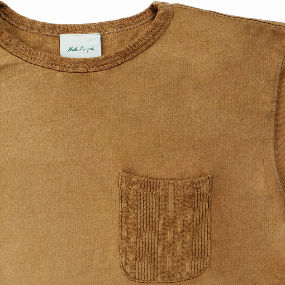 100% cotton   Ribbed collar and chest pocket  Enzyme washed   Updated fit   Made in Los Angeles