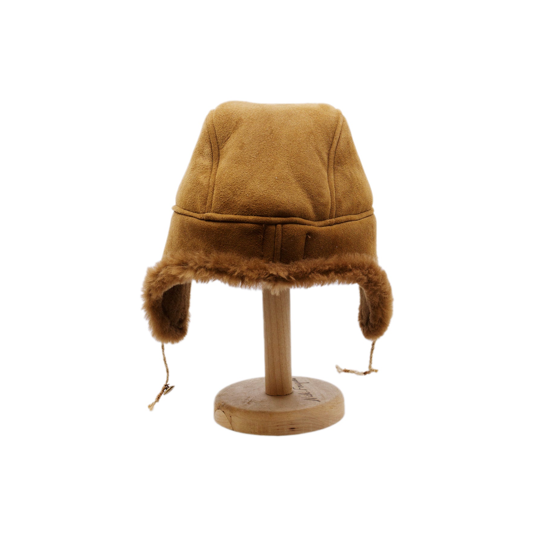 Aspen Highlands Trapper Hat Shearling Leather  Braided twine and metallic button closure  Gold plated and ceramic accouterments will vary from hat to hat  Made in Los Angeles