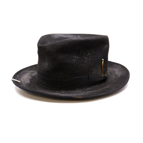 Nautholsvik  100% felt hat in Black   Dress Weight  1” tonal herringbone band & bow   Distressed and crushed  Stove top hat with baby binding    Silver NF swag clip    Flanged brim  Made in USA