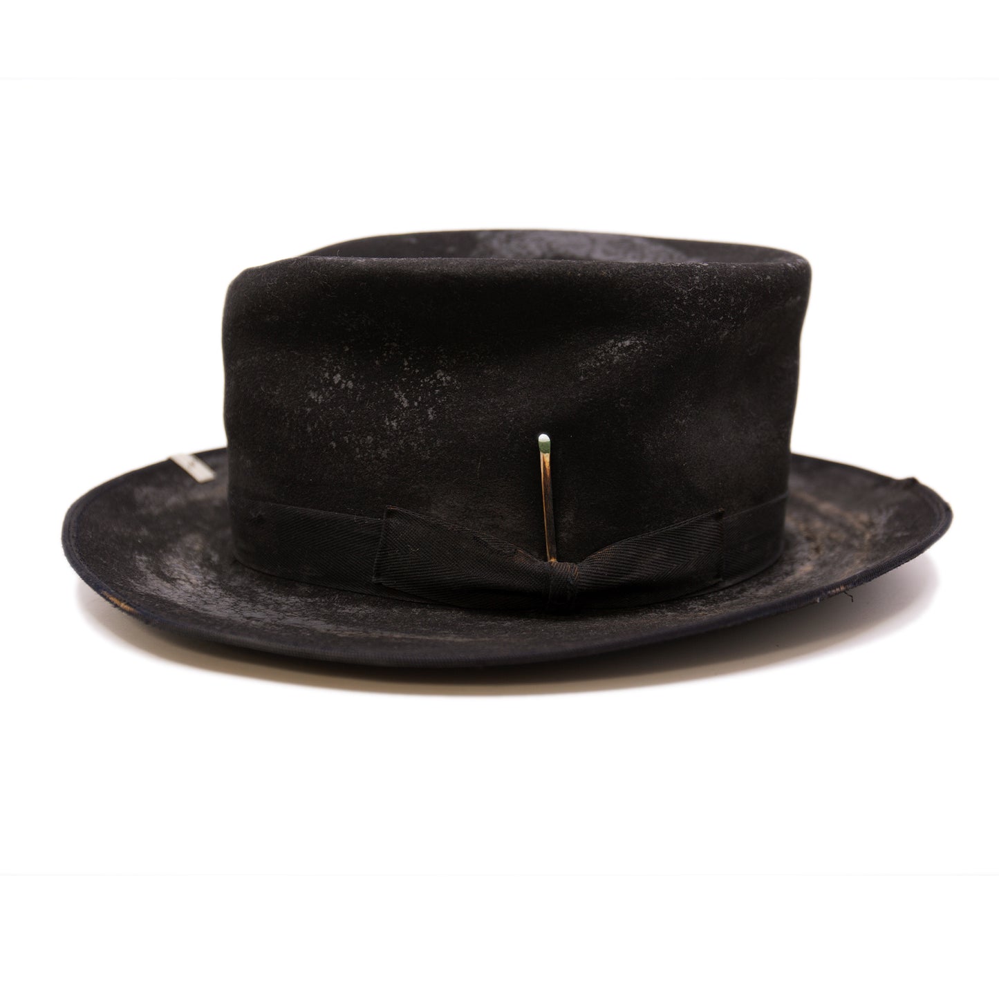 Nautholsvik  100% felt hat in Black   Dress Weight  1” tonal herringbone band & bow   Distressed and crushed  Stove top hat with baby binding    Silver NF swag clip    Flanged brim  Made in USA