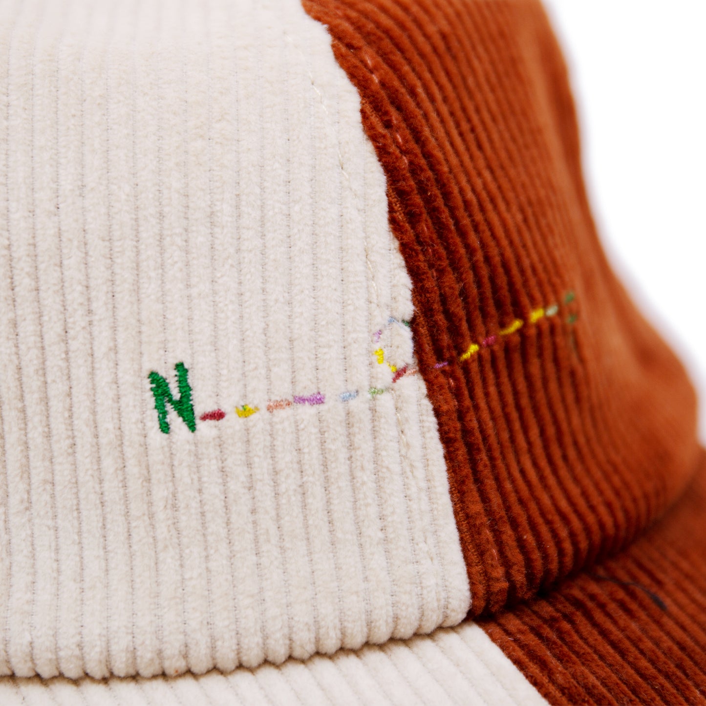 PSG CAP 100% corduroy baseball cap in Camel/Cream  Multicolor N----F embroidery  Tan suede adjuster strap  Made in USA