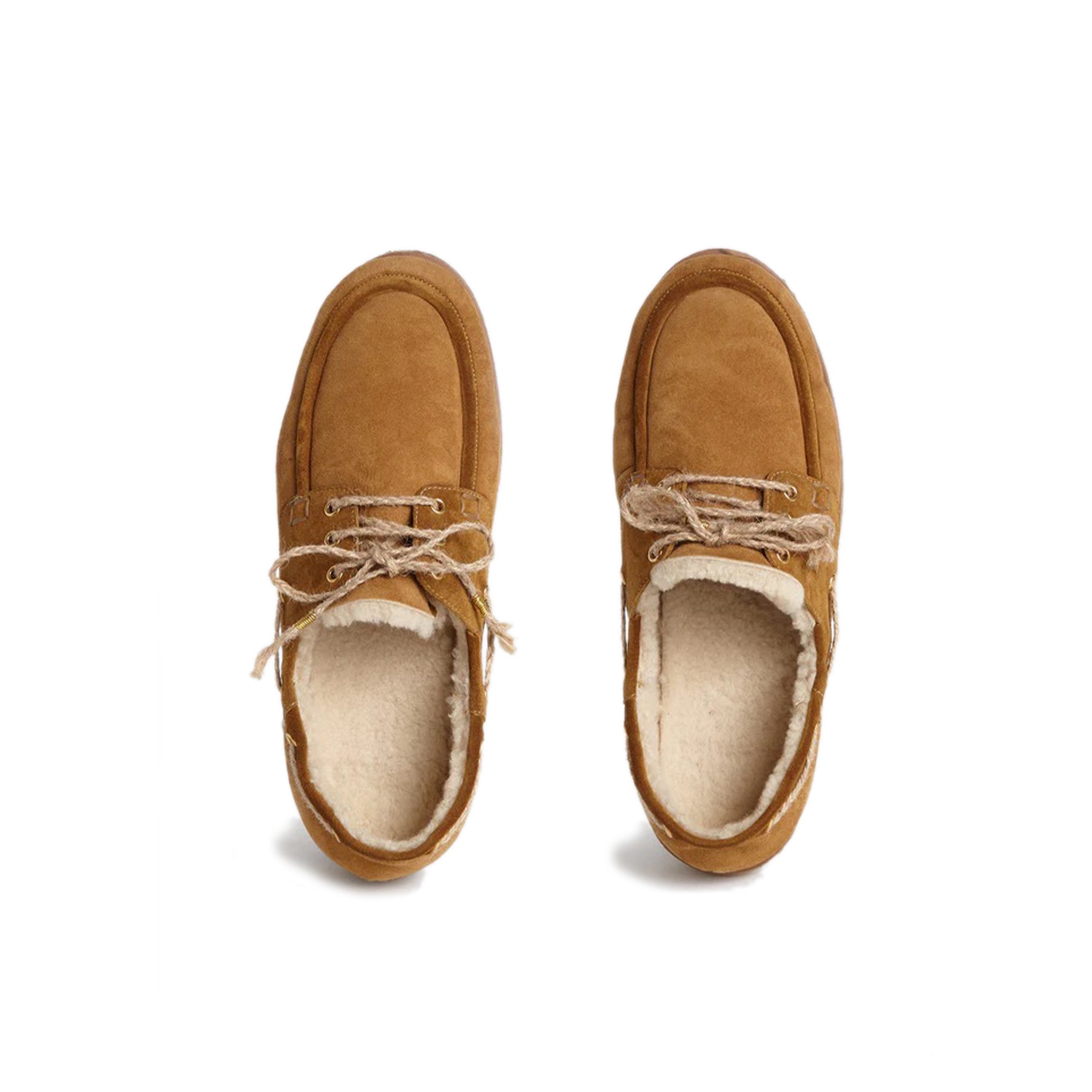 Shearling Boat Shoe - Tan Trim Fur lambskin boat shoes featuring tan trim Gold-tone eyelets Rope shoe laces with gold-tone embellishments Shearling lining Rubber sole Country of origin: Italy