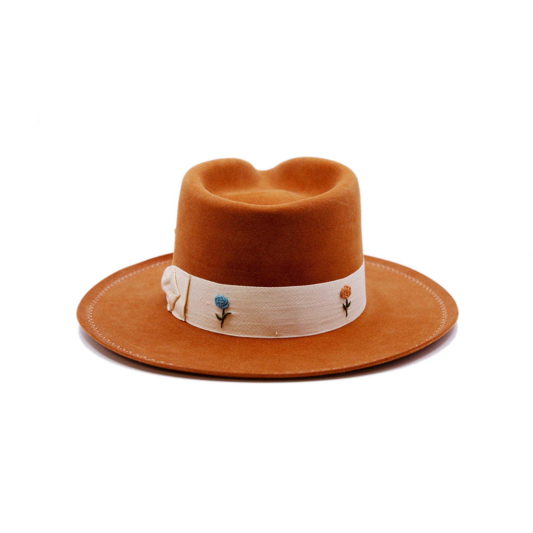 Fleure de Mal  100% felt hat in Kaia  Western Weight  1 1/2" cream herringbone band with spider bow   Multi color hand embroidered flowers on band  Cream zig zag stitching on brim  Slight pencil curled brim  Made in USA