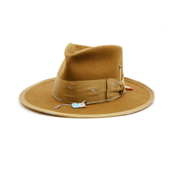 Côte Sauvage  100% felt hat in Baby Suede  Dress Weight  2" distressed tonal grosgrain band and bow   Blue NF fabric showing through band   NF Italian chain on base  Full binding  Flat brim  Made in USA