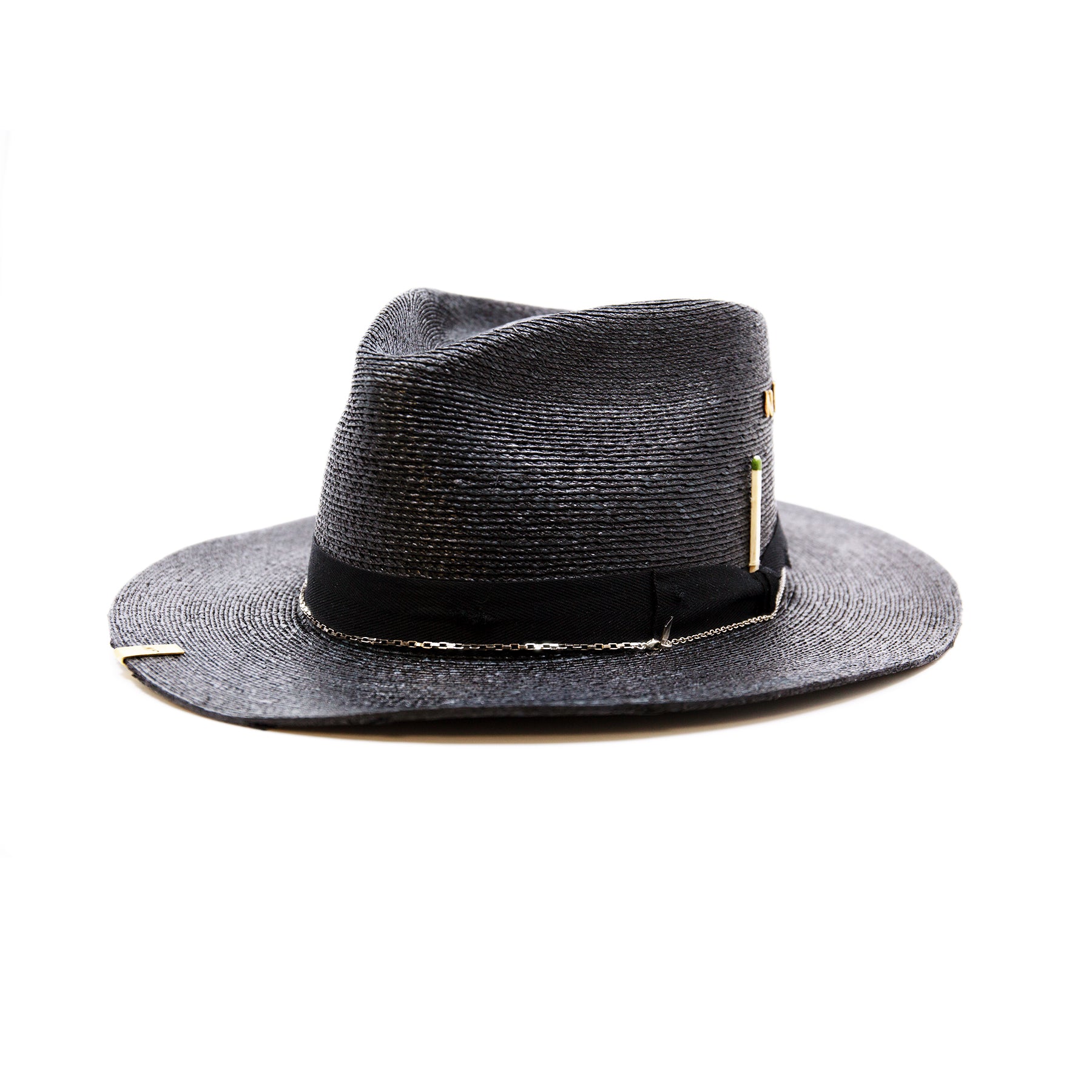 Numero 41  100% Mexican straw in Black  1" black herringbone band and bow with light distressing   NF Italian chain on base   Cartridge brass hat swag clip   NF jewelry pieces on crown   Woven in Mexico  Slight cowboy flanged brim  Made in USA